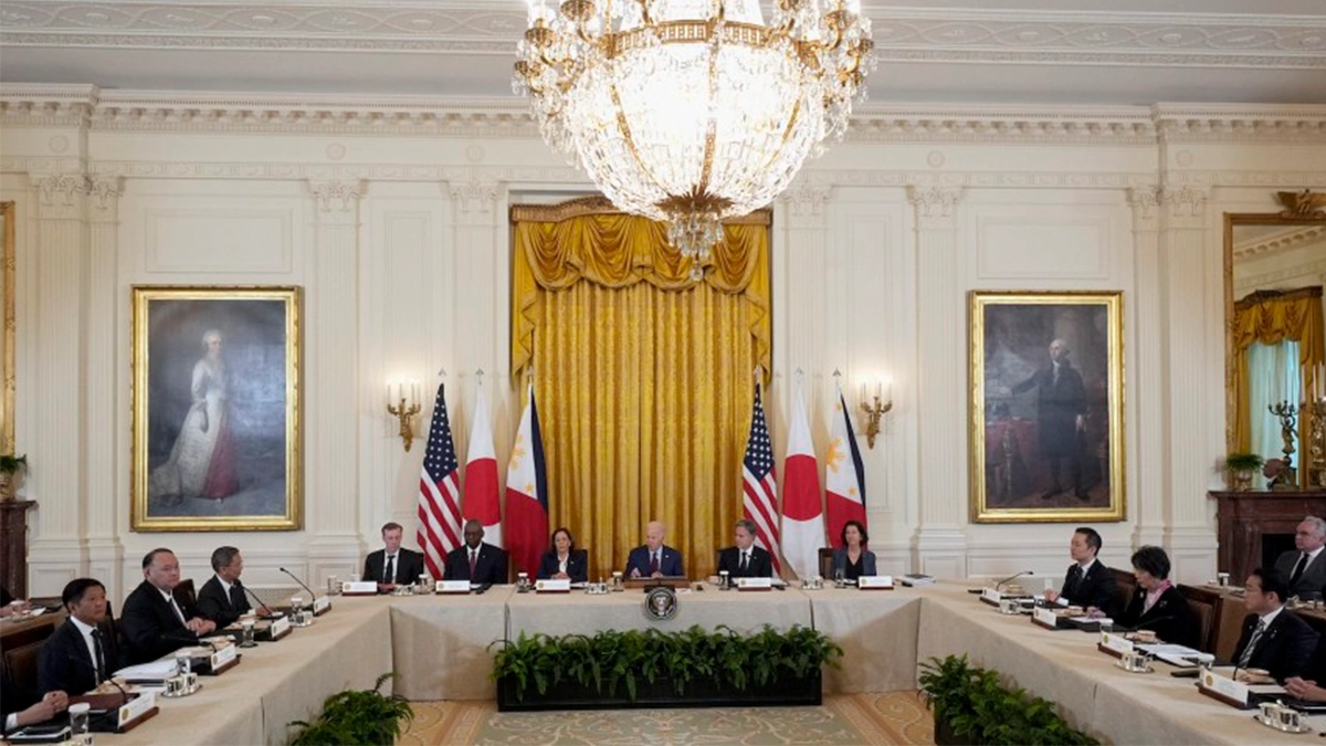 U.S. President Joe Biden, center, Philippine President Ferdinand Marcos Jr, left, and Japanese Prime Minister Fumio Kishida, right, attend a trilateral meeting in the East Room of the White House in Washington, on Thursday. Image: AP/Mark Schiefelbein